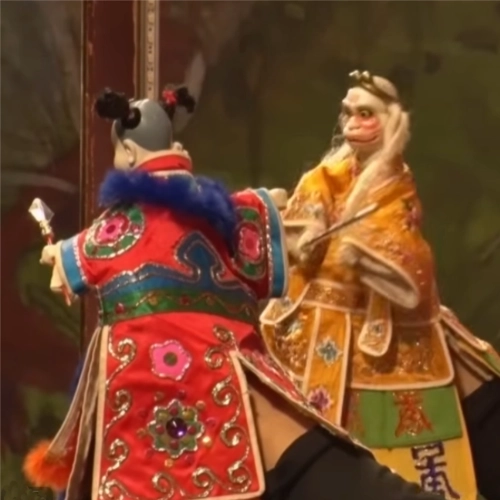 Puppets in ornate costumes